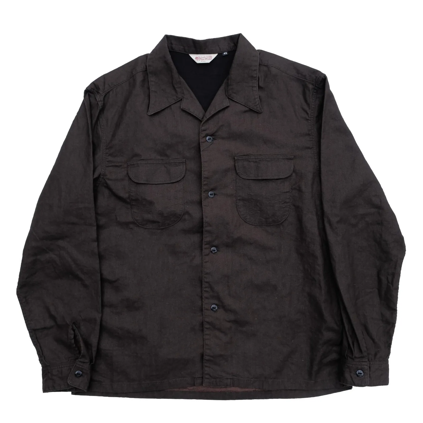 The Flat Head's bengara open-collar shirt, iron oxide hand-kneaded into the cloth