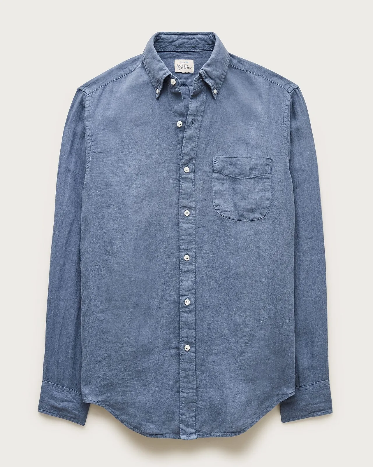 Light blue linen button-down shirt displayed against a plain light background.