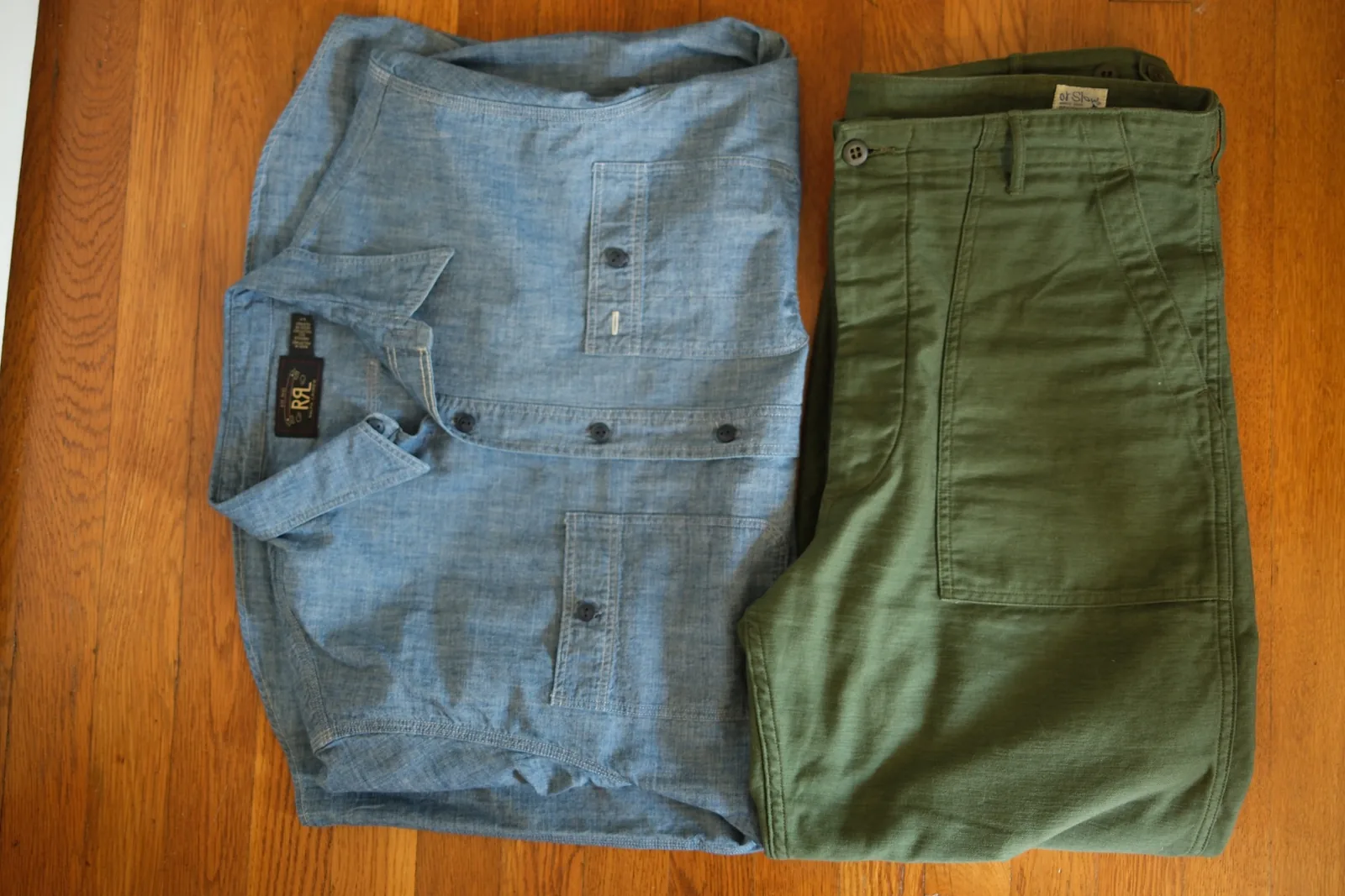 The orSlow Regular Fit Fatigue Pants in green paired with the RRL Indigo Chambray Workshirt, Chaz's go-to uniform pairing.