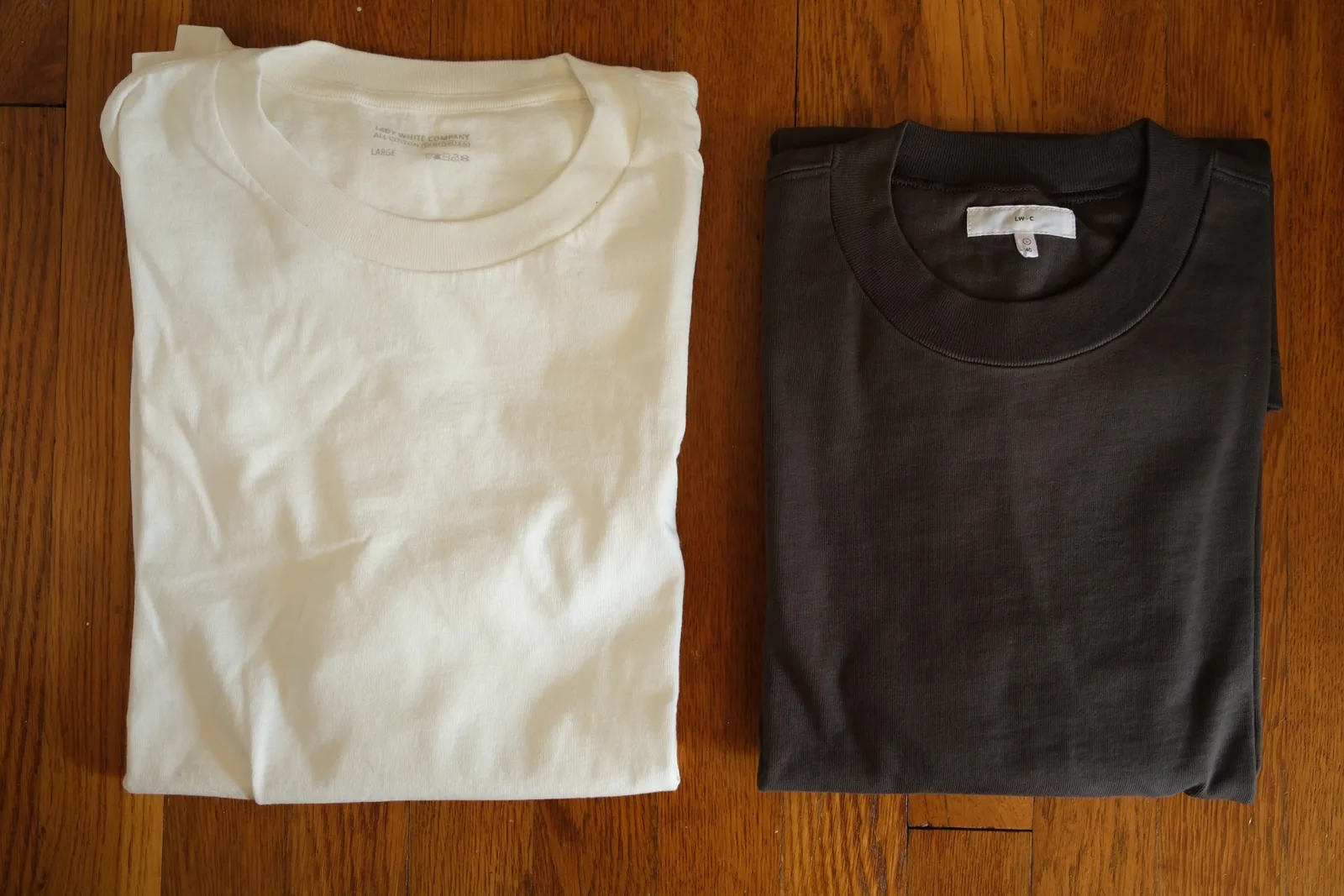 Municipal rugby tee laid flat for a fabric and construction comparison